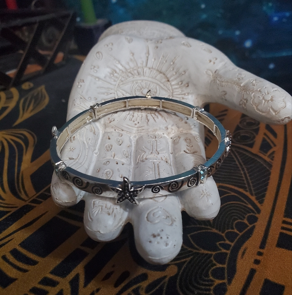 Lovely beach theme stretchy bracelet with beautiful blue crystals and starfish